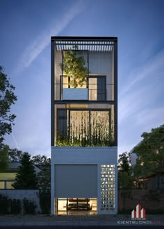 a tall building with lots of windows and plants on it