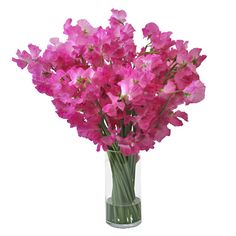 a vase filled with pink flowers on top of a table