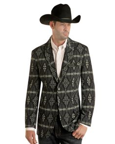 This sports coat from Rock & Roll Cowboy is a great way to dress up your look. Featuring a lapel collar, two button closure, four button cuffs, faux hip pockets, one exterior and two interior check pockets this sport coat provides the perfect balance of style and comfort. Whether you are dressing up for a night out or a corporate event, this sport coat will have you looking sharp and refined. 100% Polyester Estimated Sizing: M - 38 M - 40 L - 42 L - 44 XL - 46 XL - 48 XXL - 50 XXL - 52 Black Fitted Western Outerwear, Fitted Black Western Outerwear, Semi-formal Sport Coat With Single Button And Long Sleeves, Semi-formal Sport Coat With Single Button, Western Style Single Breasted Long Sleeve Outerwear, Western Style Single-breasted Long Sleeve Outerwear, Western Style Long Sleeve Fitted Blazer, Fitted Western Outerwear With Pockets, Black Long Sleeve Sport Coat With Single Button