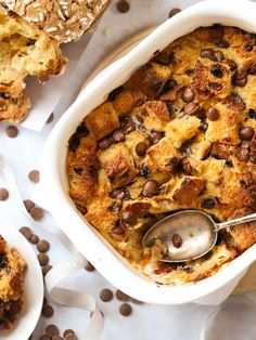 a casserole dish filled with bread and chocolate chips