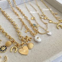 Please allow up to 1-2 weeks until shipment due to the customization aspect. Custom Charm Link Necklace Add up to 6 charms! 16" 18" option Gold Filled Charms (may vary slightly in size from preview) Irregular Pearls will vary (not exactly as pictured) Due to limited quantity of charms, we will notify you by email if your charm/s are out of stock. You can pick a replacement charm, wait until back in stock (usually 2-3 weeks) or we will issue a refund for your custom necklace. Everyday Necklace With Initial Pendant And Removable Charms, Everyday Initial Pendant Necklace With Removable Charms, Yellow Gold Charms With Adjustable Chain For Gift, Everyday Pendant Necklaces With Removable Charms, Everyday Necklaces With Removable Pendant Charms, Round Gold Plated Charm Necklaces, Dangling Charms Chain Necklace Gift, Dangling Charms Chain Necklace As A Gift, Round Charm Necklaces With Removable Charms For Gifts