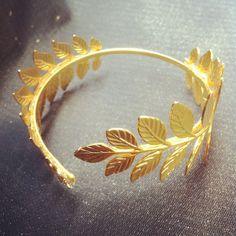 the emperor's bracelet Greek Goddess Accessories Arm, Greek Goddess Bracelet, Gold Leaf Arm Cuff, Gold Leaf Crown Greek, Bohemian Gold Leaf-shaped Jewelry, Leaf Bracelet, Greek Goddess, Gold Leaf, Wrap Bracelet