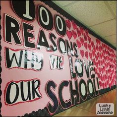 a bulletin board with words and hearts on it that read, too reason we love our school