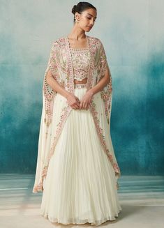 Ivory Embellished Georgette Cape Set With Lehenga Suhino - Fabilicious Fashion Lehenga With Long Jacket, Bandhani Jacket, Cape Dress Indian, Lengha Design, Ombre Lehenga, Indo Western Outfits For Women, Indo Western Dresses For Women, Open Skirt, Jacket Lehenga