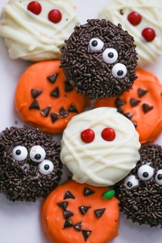 halloween cupcakes with chocolate frosting and sprinkles