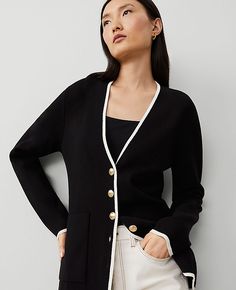 Elevate your wardrobe with the Ann Taylor Tipped V-Neck Sweater Blazer, a perfect blend of comfort and chic style. This piece is designed to add a sophisticated touch to any outfit, whether you're heading to the office or enjoying a casual day out.  - **Size:** Large - **Color:** Black/White Multi - **Material:** 72% Viscose, 28% Nylon - **Gender:** Female - **Fit:** Softly fitted - **Length:** 27 1/2 inches long - **Features:** V-neck, long sleeves, button front, front patch pockets - **Care:** Black And White Business Casual, White Business Casual, Sleeveless Wrap Top, Petite Sweaters, Black Suit Jacket, Knitted Suit, Summer Sweaters, Sweater Blazer, Long Sleeve Jacket