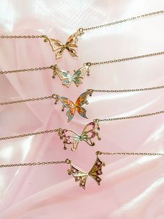 "🦋 Inspired by Season 3 of the animated show Winx, grab these necklaces to wear and flaunt your inner fairy! Chain length is 16\" to 18\" (extendable)! ⭐️ comes with a jewelry box/case, polishing cloth* * based on supply availability ‼️ If you would like to receive individual boxes for each necklace, please mark them as gifts! If an order with more than one necklace is not marked as a gift, it will be packaged with only one box." Adjustable Fairycore Necklaces For Party, Adjustable Fantasy Necklace As Gift, Adjustable Fantasy Necklace Perfect For Gifts, Adjustable Fantasy Necklaces For Gifts, Adjustable Fantasy Style Necklace Perfect For Gifts, Fairycore Clavicle Chain Necklace As Gift, Whimsical Necklaces For Gifts, Fairycore Clavicle Necklace As A Gift, Fairycore Butterfly Necklace Gift