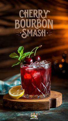 the cherry bourbon smash is ready to be served with lemon wedges and minty garnish