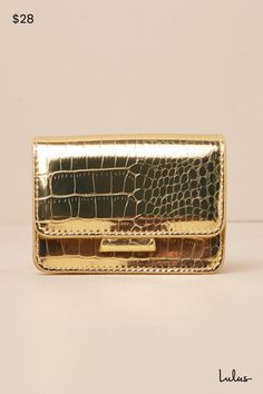 Finish any statement-making look with an extra trendy accessory like the Lulus Impactful Shine Gold Croc-Embossed Mini Crossbody Bag! This ultra-cute (and ultra-mini) bag has a shiny, silver-toned faux leather construction that features crocodile-embossing as it shapes a structured silhouette with a flat bottom design. The front flap boasts hidden magnetic closures that lift to reveal a lined, compact interior. A detachable, silver crossbody chain strap allows for a chic hands-free look. Lined. Wineries Outfit, Bottom Design, Vegan Handbags, Mini Crossbody Bag, Mini Crossbody, Trendy Accessories, Shiny Silver, Hands Free, Handbag Accessories