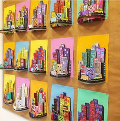 colorful cityscapes are hanging on the wall