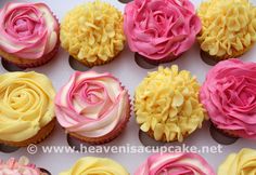 cupcakes with pink and yellow frosting are arranged on a white plate,