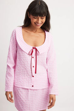 Checked Tie Front Top Pink Button-up Blouse For Loungewear, Long Sleeve Pink Blouse For Fall, Pink Long Sleeve Blouse For Fall, Pink Long Sleeve Cotton Blouse, Pink Long Sleeve Blouse For Loungewear, Pink Long Sleeve Blouse For Daywear, Pink Long Sleeve Top For Daywear, Pink Long Sleeve Feminine Top, Feminine Pink Long Sleeve Top