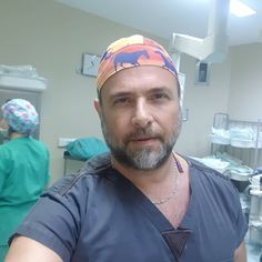 a man with a bandana on in a hospital room