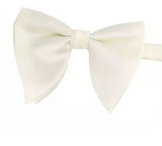 Stylish Bowtie for weddings and special occasions. Adjustable  band. Free delivery in the UK. White Standard Bow Tie, Classic White Tie For Wedding, Dapper White Ties For Black Tie Events, White Dapper Ties For Black Tie Events, Dapper White Tie For Black Tie Events, Dapper White Adjustable Suit And Tie Accessories, Adjustable White Bow Tie, Classic White Wedding Tie, White Adjustable Standard Bow Tie