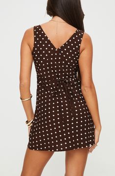 A tie-back detail ensures a perfect fit when you slip into this polka-dot minidress. 32" length (size 8) Hidden side-zip closure V-neck Sleeveless 100% polyester Machine wash, line dry Imported Nellie Mini Dress, V Neck Mini Dress, Brown Polka Dots, Fleece Dress, Outerwear Outfit, Invisible Zip, Loungewear Sets, Curve Dresses, Tops Fall