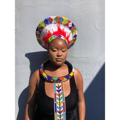 Price is only for the hat. The accessories sold separately. ZULU HAT is called ISICHOLO in traditional Zulu language and is traditionally worn during religious and cultural ceremonies. by the married Zulu woman of South Africa   The form of the isicholo, or married woman's hat, developed out of a 19th-century conical hairstyle that was worn as a sign of respect to one's husband and his family, in addition to serving as a public symbol of married status. In the early 20th century, a removable hat like this one replaced the hairstyle. This zulu accessory will make an amazing gift for a friend or partner. If you would like to standout. You have to try this on. Refund guarantee: It is guaranteed to satisfy or we will. give your money back Zulu Language, Zulu Hat, Basket Hat, Zulu Wedding, African Crown, African Hat, Zulu Women, African Inspired Jewelry, African Hats