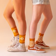 Step into a world of nostalgia with our Retro Flower Striped Ribbed Crew Socks. These super comfy socks feature a fun retro flower print and ribbed material, adding a playful flair to any outfit. Adorably designed, they're sure to become your new faves! Featuring sustainably sourced packaging and crafted with global organic textile standard certified organic cotton. Trendy Orange Socks For Spring, Fun Socks Outfit, 70s Socks, Creamsicle Aesthetic, Button Pouch, Retro Flower Print, Aesthetic Socks, Sock Outfits, Comfy Socks