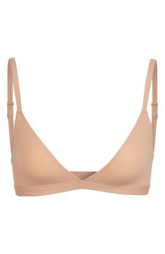 Enjoy the comfort of a bralette while retaining the breathability of quick-dry fabric with this comfortable option from Kim Kardashian West's SKIMS. Available in nine different shades, this second-skin triangle bra offers natural support and comfort while you read, lounge and sleep. Style Name:Skims Fits Everybody Triangle Bralette (Regular & Plus Size). Style Number: 6016426. Plus Size Style, Triangle Bralette, Triangle Bra, Second Skin, Kim Kardashian, String Bikinis, Bralette, Lounge, Sleep