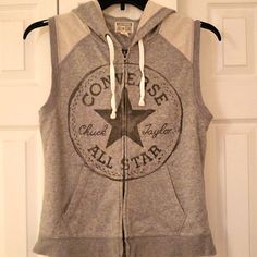 Gray Converse Sleeveless Zip Up Hoodie. Never Worn! Sporty Sleeveless Hoodie For Spring, Casual Sleeveless Winter Top, Sporty Sleeveless Hoodie For Fall, Sporty Sleeveless Fall Hoodie, Casual Streetwear Vest, Fall Streetwear Sleeveless Tank Top, Sporty Cotton Vest For Spring, Casual Gray Vest For Streetwear, Casual Hooded Vest