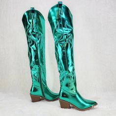 Stunning New Metallic Thigh High Cowgirl Boots Embroidered Design 2.5" Western Cut Composite Heels Woman's Us Sizes Approx. Measurements Top Opening 18" Calf 15.5" Total Height Including Heel 25" Casual Thigh High Heeled Boots For Party, Casual Over-the-knee Party Boots, Green Platform Boots For Party, Trendy Green Platform Boots For Party, Trendy Fitted Green Boots, Thigh High Cowgirl Boots, Western Style Knee-high Heeled Boots For Party, Western Style Knee-high Party Heeled Boots, Green Knee-high Heeled Boots For Fall