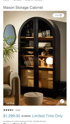 a living room with a chair and a book case in it's corner area