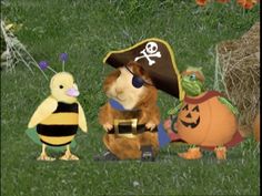 two stuffed animals dressed up in costumes and one is wearing a pirate's hat