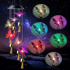 colorful wind chime with butterflies and stars in the night sky above it are four different colors