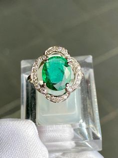 SALE For a limited time, save $370! with 10% off. Originally $3,700. Unique and one of a kind. Gorgeous deep emerald color. We utilize only oil as customary with natural emeralds, no treatments to any of the stones. Free Certification available upon request and Free Shipping. You get this actual ring, not a re-production. SETTING Metal: 18k White Gold Certificate: Including with Ring & free of charge. Ring Size: 6.25Size Selectable (4-9 US sizes) Appraised Value: $ 5000 USD MAIN STONES Type: Elegant Untreated Oval Emerald Ring, Elegant Untreated Green Emerald Ring, Oval Untreated Green Emerald Ring, Gia Certified Green Emerald Ring, Untreated Oval Green Emerald Ring, Gia Certified Oval Green Emerald Ring, Gia Certified Green Oval Emerald Ring, Gia Certified Oval Emerald Ring, Emerald Ring Vintage