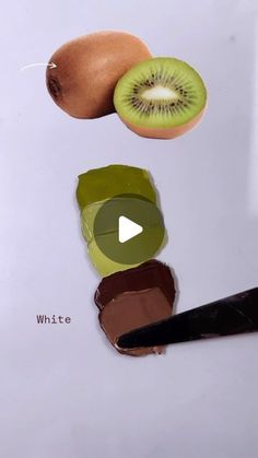 an apple, kiwi and other fruits are being cut in half