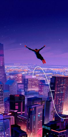 a person flying through the air over a city at night