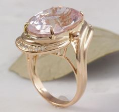 16.18 Carats Exquisite Natural Pink Kunzite and Diamond 14K Solid Rose Gold Ring Appraised Value 8,900.00 Total Natural Oval Shaped Kunzite Weights: 15.90 Carats (VS) Kunzite Measures: 18.36 x 13.52mm Natural Round Diamonds Weight: .28 Carats (color F-G / Clarity VS2) Ring total weight: 10.7 grams Disclaimer: all weights, measurements and colors are approximate and may vary slightly from the listed dimensions or as seen in the image. All pictures are magnified to show the smallest of details. Pl Pink Kunzite, Quality Diamonds, Estate Jewelry, Rose Gold Ring, Jewellery And Watches, Gold Ring, Round Diamonds, Statement Rings, Gemstone Jewelry