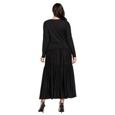 This long sleeve maxi dress features a graceful and flowing design with a tiered hem, creating an elegant and timeless look that is perfect for any semi-formal or casual occasion. Black Long Sleeve Maxi Dress With Ruffle Hem, Black Long Sleeve Dress With Pleated Hem, Flowy Tiered Maxi Dress For Fall, Fall Tiered Maxi Dress With Ruffle Hem, Fall Tiered Skirt Maxi Dress With Ruffle Hem, Fall Maxi Dress With Ruffle Hem And Tiered Skirt, Elegant Fall Maxi Dress With Ruffle Hem, Black Tiered Skirt Maxi Dress With Ruffle Hem, Black Tiered Maxi Dress With Ruffle Hem