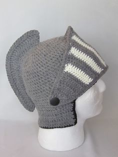 a crocheted elephant hat on top of a white mannequin head