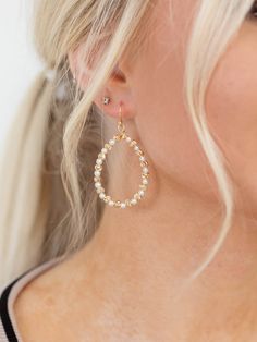 These teardrop shaped earrings feature a unique metal and pearl ball detail to add a more casual inspired touch to the look. Bridal Shower Outfit, Denim Hoodie, Dressy Dresses, Cold Weather Accessories, Style Gift, Gift Accessories, Wide Leg Denim, Stylish Shirts, Teardrop Earrings