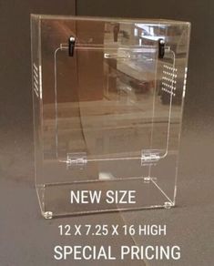 a clear acrylic display case with the words new size 12x7 25 x 16 high special pricing