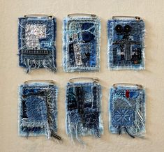 four pieces of art made out of old jeans