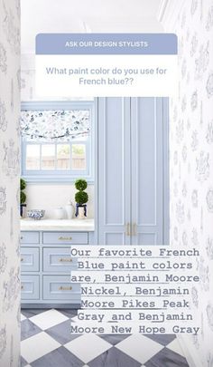 a bathroom with blue cabinets and wallpaper on the walls is featured in an article about what paint color do you use for french blue?