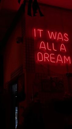 a neon sign that says it was all a dream