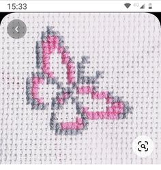 the cross stitch pattern is in pink and grey on a white background with words that spell love