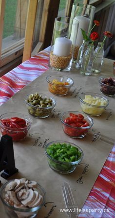 a table topped with bowls filled with different types of food