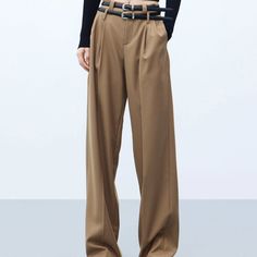 Upgrade your wardrobe with MO&Co.'s Women's Wool Blend Pleated Pants. These wide-leg trousers feature a relaxed fit, full length and double belt loops, front pleats and centerfolds for a tailored look. Plus, back welt pockets & slanted pockets; Free Shipping Over $235, Express Delivery & 14-Day Easy Return.