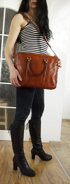 "Cognac Leather Messenger, Personalized, Cognac Laptop Bag, Cognac Leather Bag, Cognac Leather satchel, Cognac Leather Crossbody Bag, fits a 15 inches Laptop Made from textured cowhide (origine Italy) Features: Inside One main compartment inside fully lined with cotton fabric Zipper for closure One large inside zip pocket Two large inside pockets Outside dimensions: W: 14.8\" (37.5 cm) H: 11.2\" (28.5 cm) D: 2.4\" (6 cm) Two handles One detachable adjustable shoulder cross-body strap Estimated d Cognac Saddle Shoulder Bag With Leather Handles, Formal Cognac Satchel Shoulder Bag, Cognac Saddle Bag For Formal Occasions, Formal Cognac Flap Shoulder Bag, Formal Cognac Shoulder Satchel, Formal Cognac Shoulder Bag, Cognac Shoulder Bag With Leather Lining, Classic Vintage Brown Bag With Leather Handles, Luxury Brown Saddle Satchel