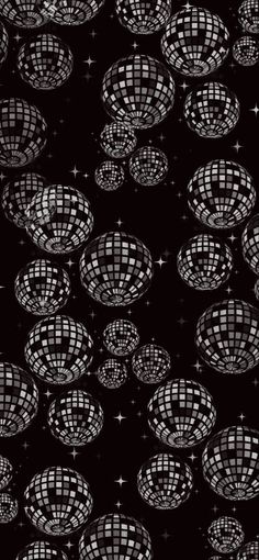 black and white disco balls with stars in the background