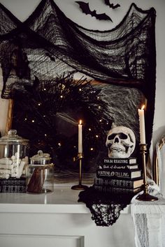 there is a halloween decoration on the mantle