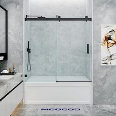 a bathroom with marble walls and flooring