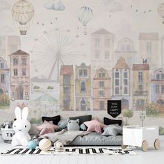 Bring your child's room to life with our Cityscape Watercolor Wallpaper Mural. Featuring charming European streets and playful hot air balloons, this peel and stick wallpaper adds a touch of whimsy and adventure to any space. Perfect for kids' rooms, it offers an effortless way to create a delightful and engaging environment. High-quality material ensures durability and easy application. Let your little one's imagination soar with this vibrant and captivating design. We are able to offer CUSTOM SIZING for any wall size, just write us a message with your amazing walls dimensions and Team Giffy will get in touch with you as soon as possible to serve you the best wallpaper design with NO EXTRA COST * Our peel and stick wallpapers are amazing and cost-effective. We use only top-grade materials Playroom Painted Wall Mural, Playroom Wall Mural, European Streets, Nursery Murals, Wall Art Kids Room, City Kid, Wall Art Kids, Kids Room Wallpaper, Balloon Wall