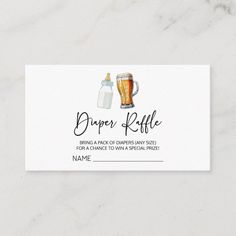 a beer bottle and a glass on top of a white business card with the words, paper raffle