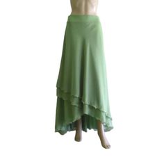 "It is made from soft and good quality Chiffon fabric. This is made to order in your measurements. Skirt length: 30\" x 40\".It can be made longer or shorter. It is made with a zipper. You can choose other colors from the color chart. When you order please give me your measurements: 1: The length of the skirt from the top of the waistline to the bottom hem. 2: Waist ( where you want the waistline to be). 3: Hips ( around the fullest part) 4: And your color choice. *When you order will have a pla Fitted Green Ruffled Maxi Skirt, Fitted Green Maxi Skirt With Ruffles, Fitted Chiffon Asymmetrical Skirt, Fitted Asymmetrical Chiffon Skirt, Fitted Chiffon Tiered Maxi Skirt, Green Stretch Flared Maxi Skirt, Flowy Green Ruffled Skirt, Flowy Green Gathered Skirt, Fitted Green Maxi Skirt With Gathered Detail