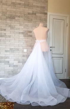 Diamond shaped asymmetric organza wedding train with horsehair hem - a truly elegant and unique adding to your bridal gown. Only high quality fabrics and high finishing used for making the wedding skirt as neat as it can be. the length is customizable. For more wedding skirts, please access https://www.etsy.com/shop/LidiasBoutiqueDesign?ref=seller-platform-mcnav&section_id=23168823. For more wedding tops and boleros, please access https://www.etsy.com/shop/LidiasBoutiqueDesign?ref=seller-pla Long Wedding Train, Wedding Skirt Separate, Wedding Overskirt, Bridal Skirt Separate, Wedding Skirts, Wedding Tops, Wedding Train, Train Skirt, Wedding Separates