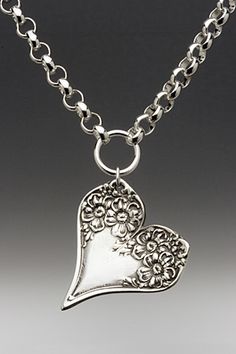 vintage heart pendant made from the ends of two spoons florentine pattern Unique Silver Heart Charm Necklace, Unique Silver Heart Necklace With Charm, Unique Silver Heart Pendant Necklace, Vintage Sterling Silver Heart Necklace Nickel Free, One Of A Kind Heart Shaped Vintage Jewelry, One-of-a-kind Heart-shaped Vintage Jewelry, Antique Silver Heart Jewelry With Oxidized Finish, Vintage Double Heart Sterling Silver Necklace, Vintage Sterling Silver Double Heart Necklace